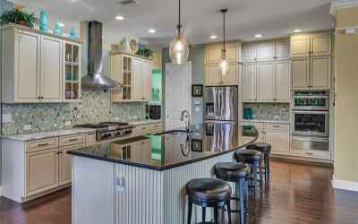 Gourmet kitchen with custom cabinets, granite countertops and Kitchen Aid Stainless Steel Appliances