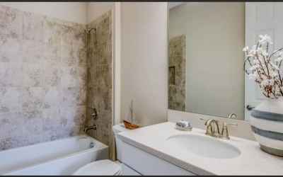 REPRESENTATIVE PHOTO. The secondary bathroom with a large  shower, great storage vanity space and be