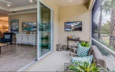 * REPRESENTATIVE PHOTO. Covered Lanai with extended screened in patio!