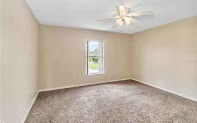Newly-painted, roomy 3rd bedroom awaits your decor.