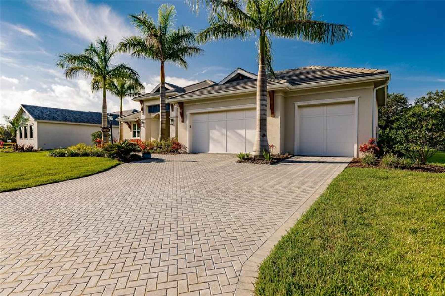 paver driveway and over sized 3 car garage