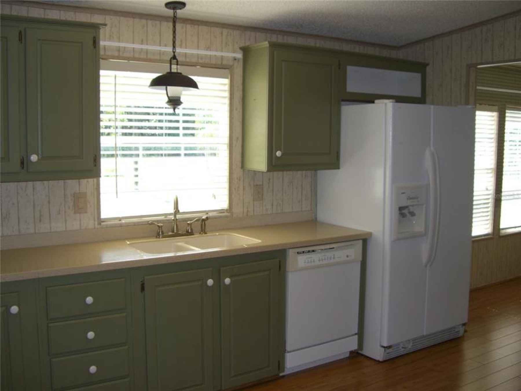 KITCHEN INCLUDES DISHWASHER AND REFRIGERATOR. LOVE THE WINDOW OVER THE SINK