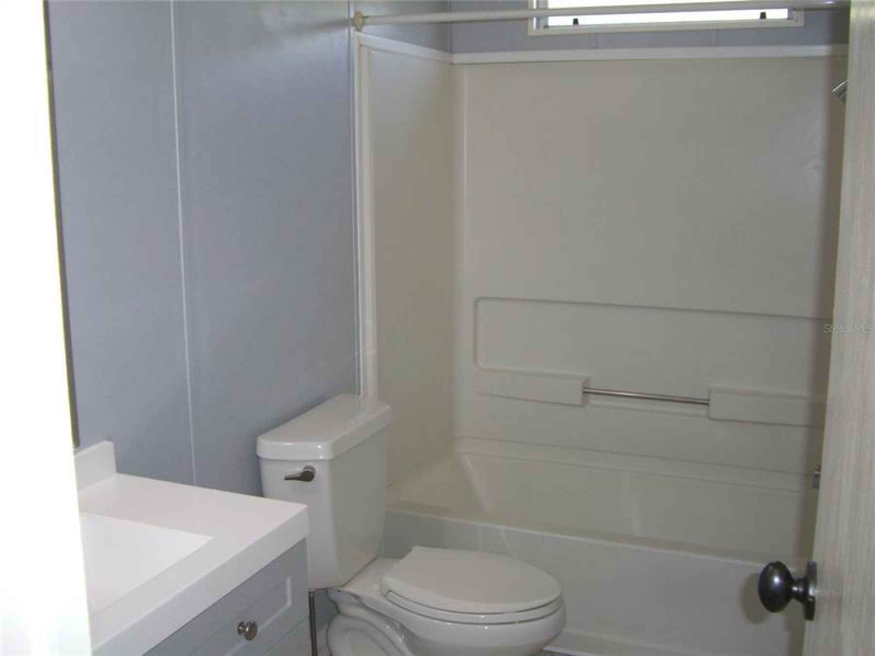 GUEST BATH HAS TUB AND SHOWER