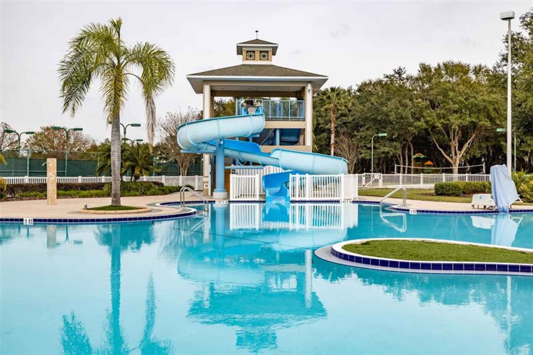 Resort style pool with slide