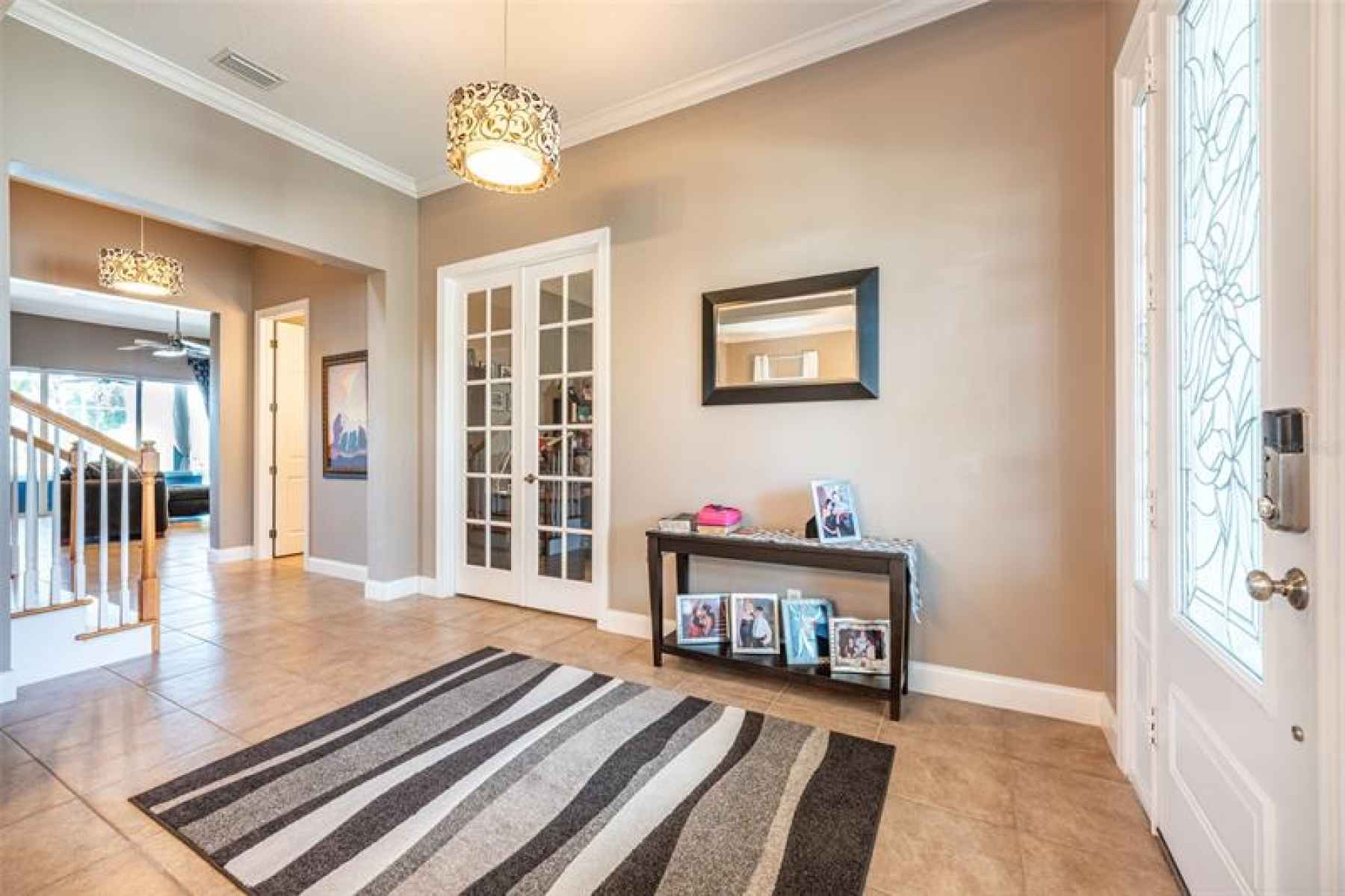 Expansive foyer to gather and welcome your family and friends.