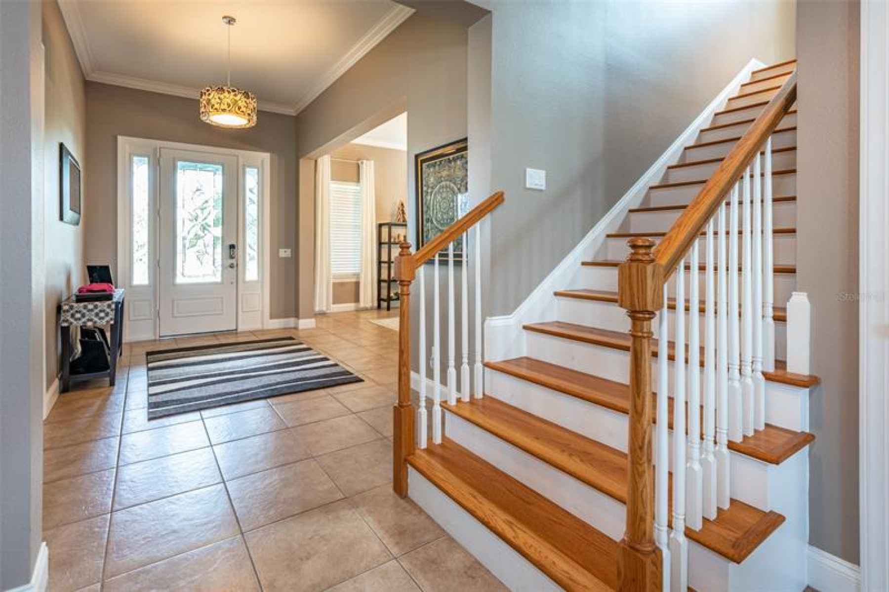Reminiscent to the center hall colonial this foyer is spacious and grand.  The home office is locate