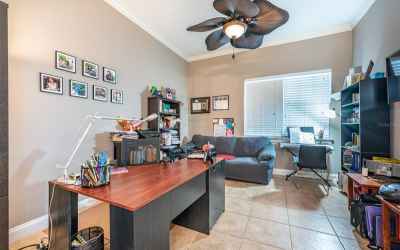 Enjoy this huge home office with tons of natural light measuring 12x14.  Plenty of room for a large 