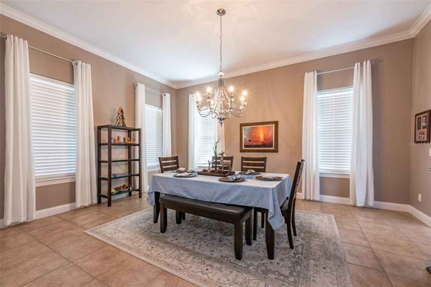 Beautiful formal dining room large enough for entire extended family or entertain your friends measu