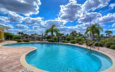 The Sunset Bay community features resort-style amenities with a pool!