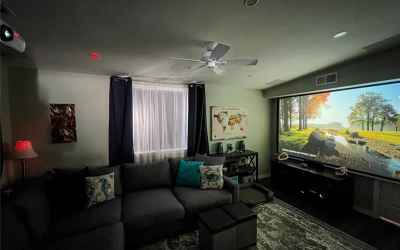 Living Room in Movie Mode With Projector Screen