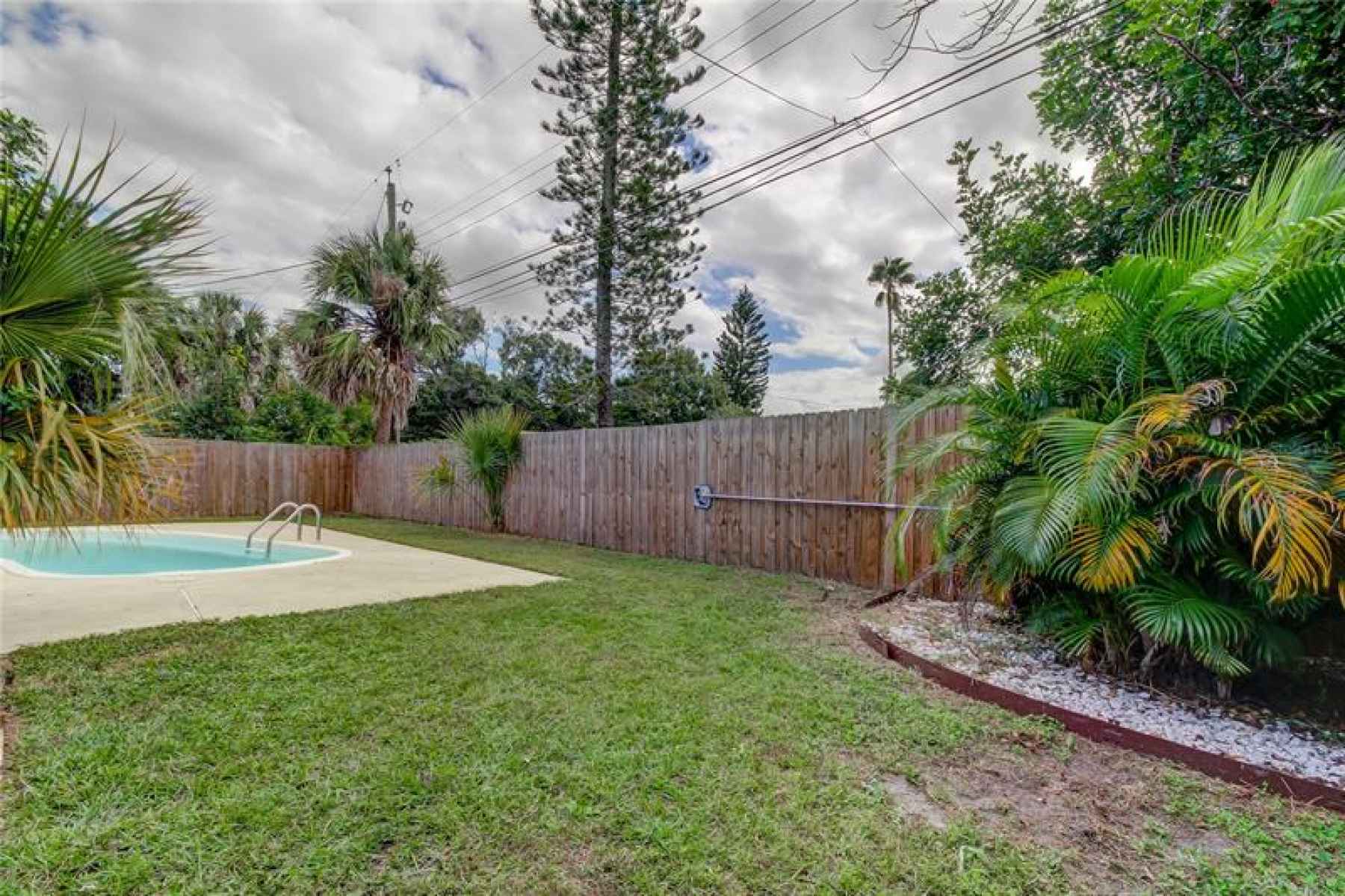 Spacious backyard with grassy area for your pets