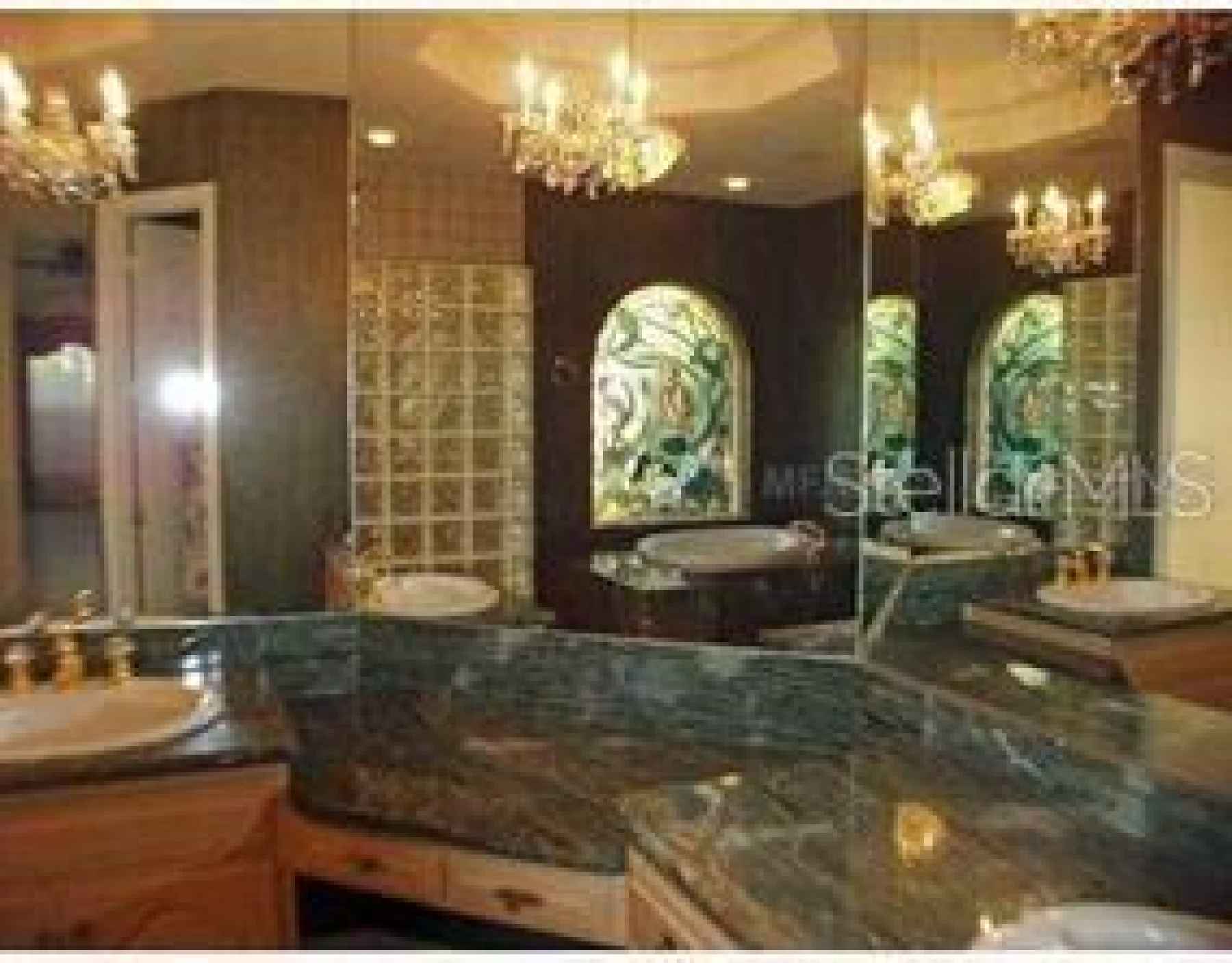 Master Bath With His and Her Vanities
