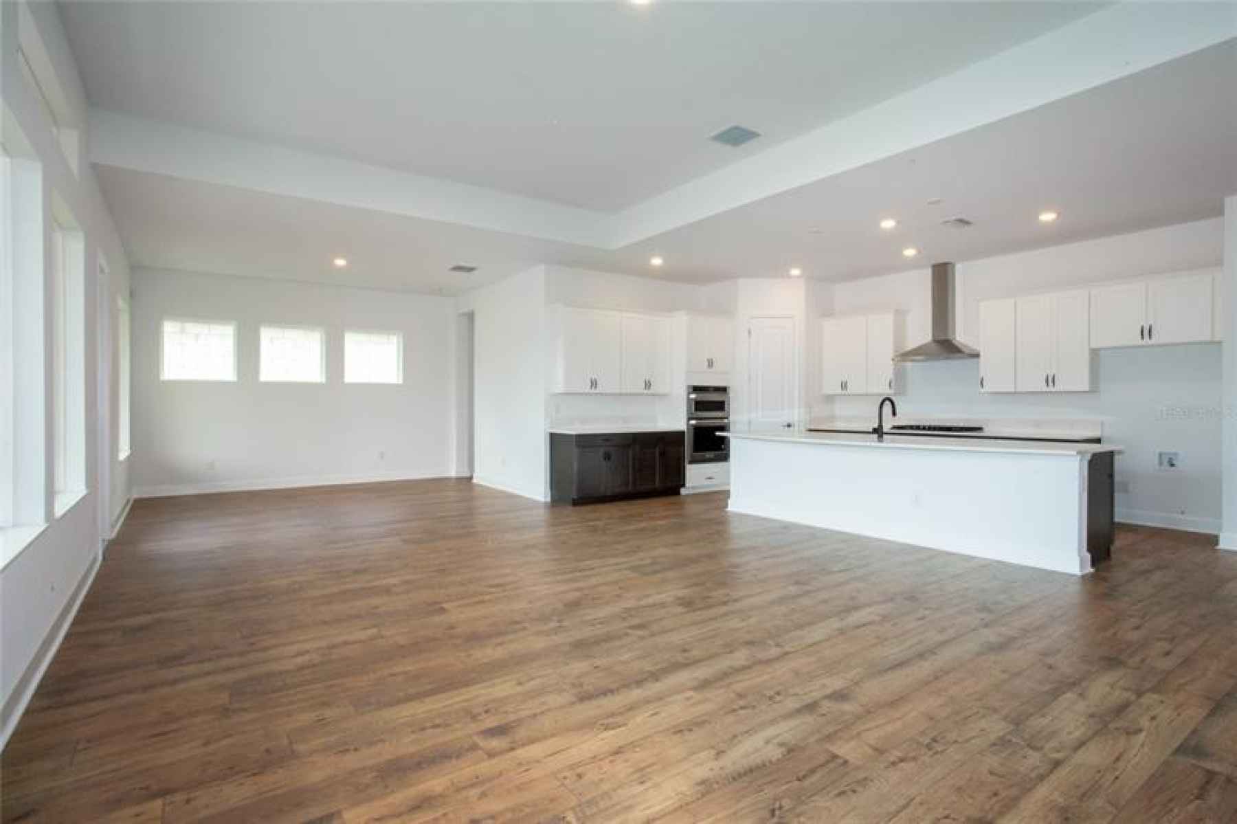 Living Room Corner towards Kitchen and Dining