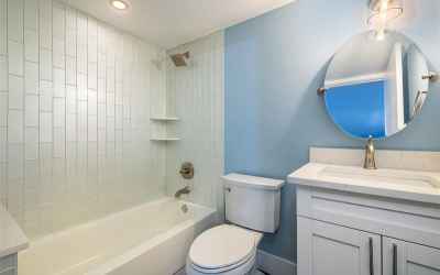 Guest Bath with Custom Tiling, Quartz Countertops, Solid Wood Cabinets - soft close dove-tailed draw