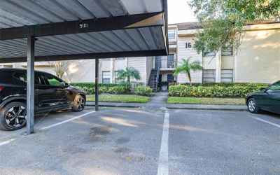Assigned Carport Parking - in front of entry door building