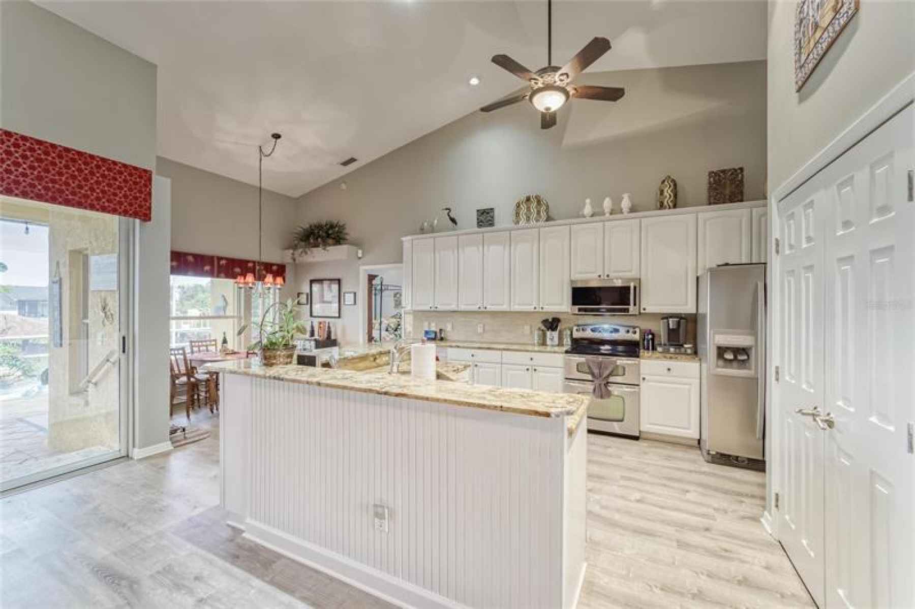 Tons of Cabinet & Counter Space - Cathedral Ceiling - Luxury Vinyl - Abundance of Natural Light
