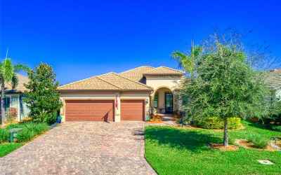 Upscale home with Paver Driveway & Tile Roof