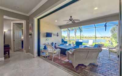 Indoor - Outdoor Flow from Great Room to Lanai w/ Extended Screen Area