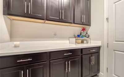 Laundry Room with Custom Built In Cabinets