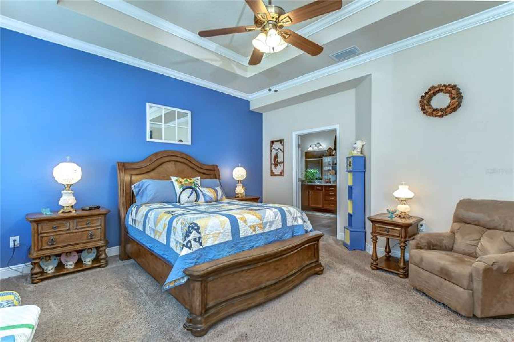 This master suite provides so much natural light and a tray ceiling with a HUGE walk-in closet!