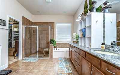 Featuring its own separate walk-in shower!
