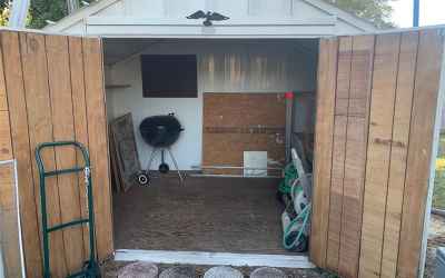 Shed with doors open.