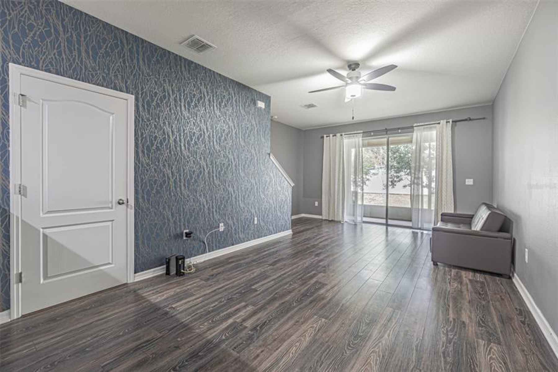 Spacious living/dining room combination offers a comfortable open concept floor plan.
