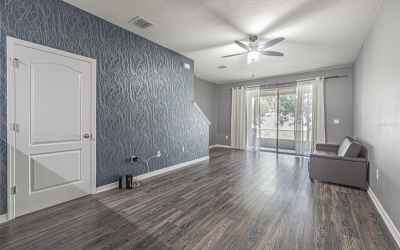 Spacious living/dining room combination offers a comfortable open concept floor plan.