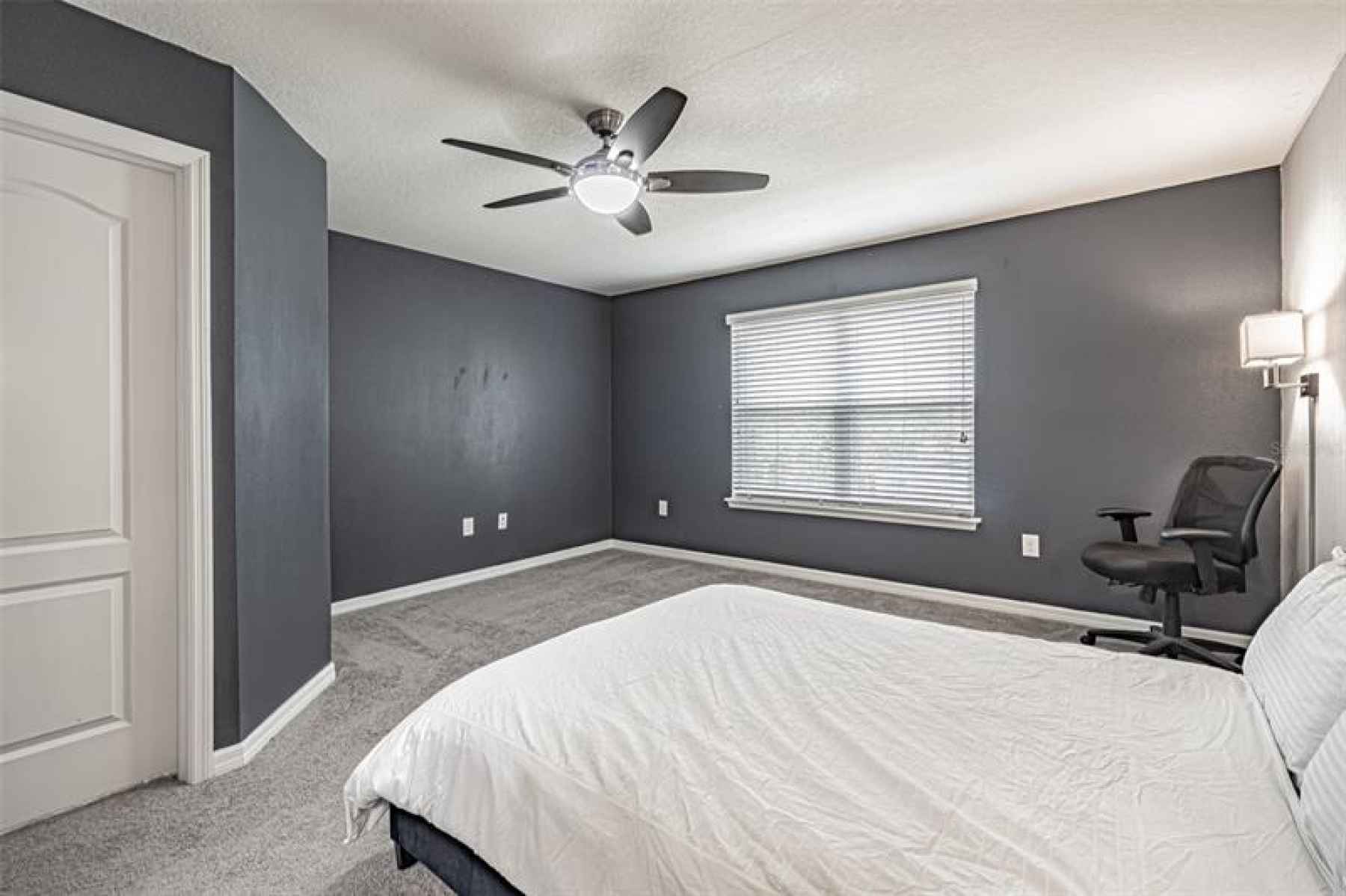 Additional area in master bedroom offers room for a dedicated office, vanity or anything else you ma