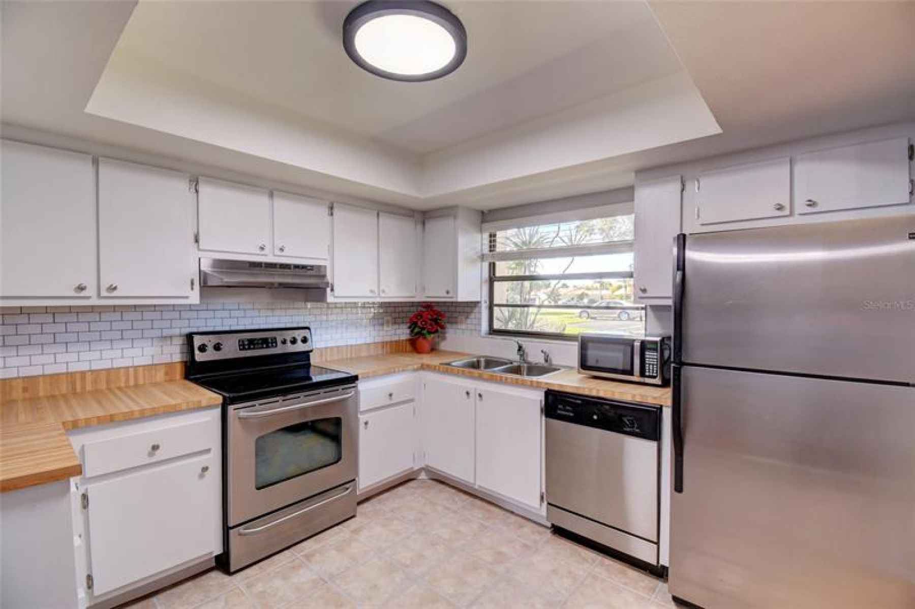 Spacious kitchen with room for dinette.