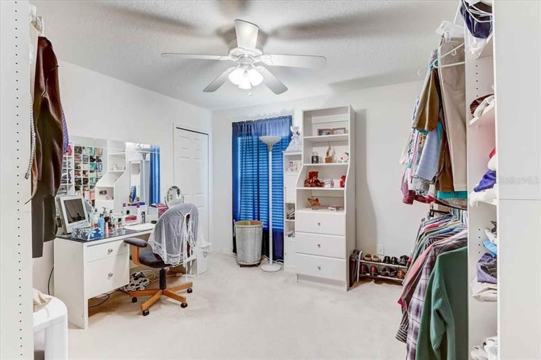 Dressing room. Has closet, could be considered an extra bedroom