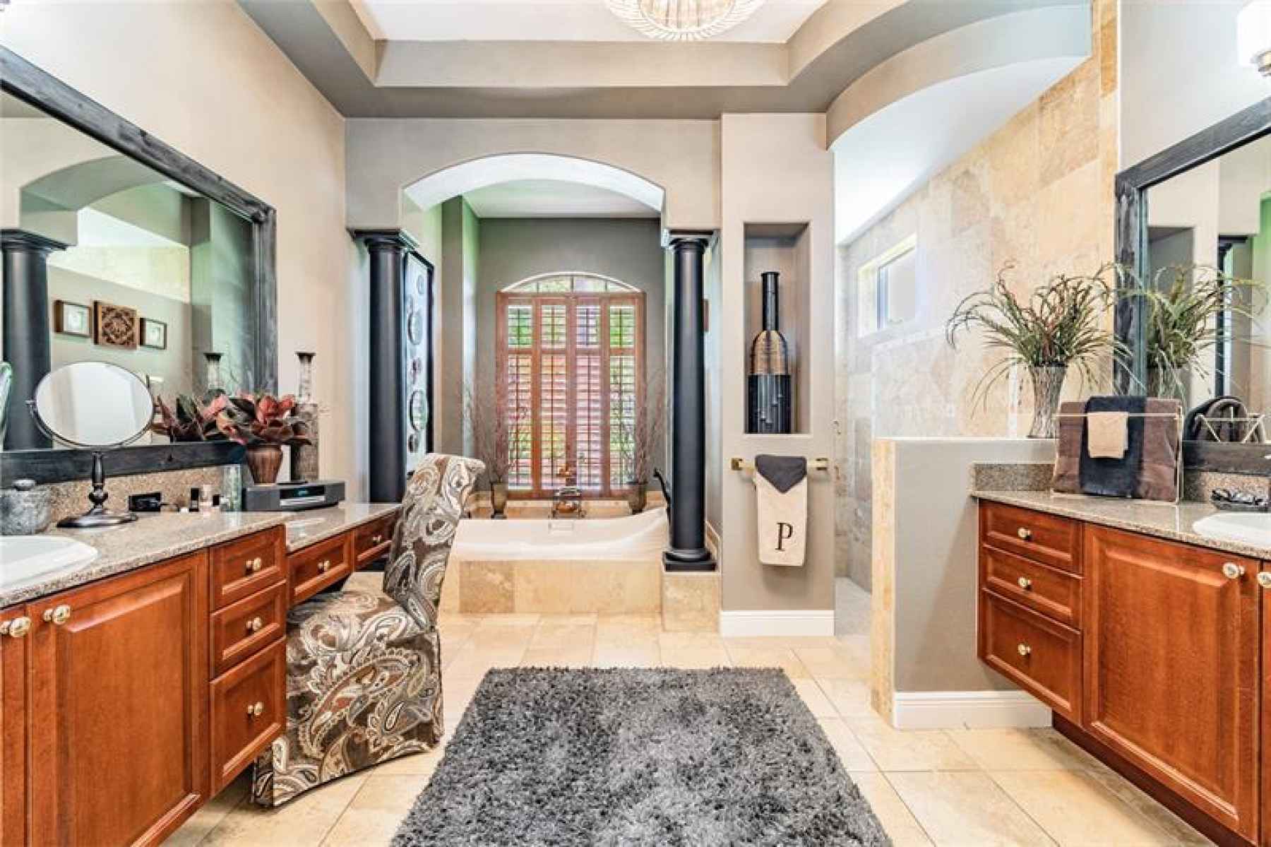 Master bathroom with garden tub and separate vanities