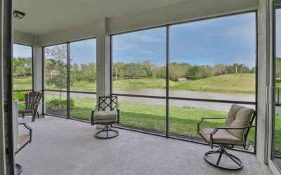 screened in patio with water views