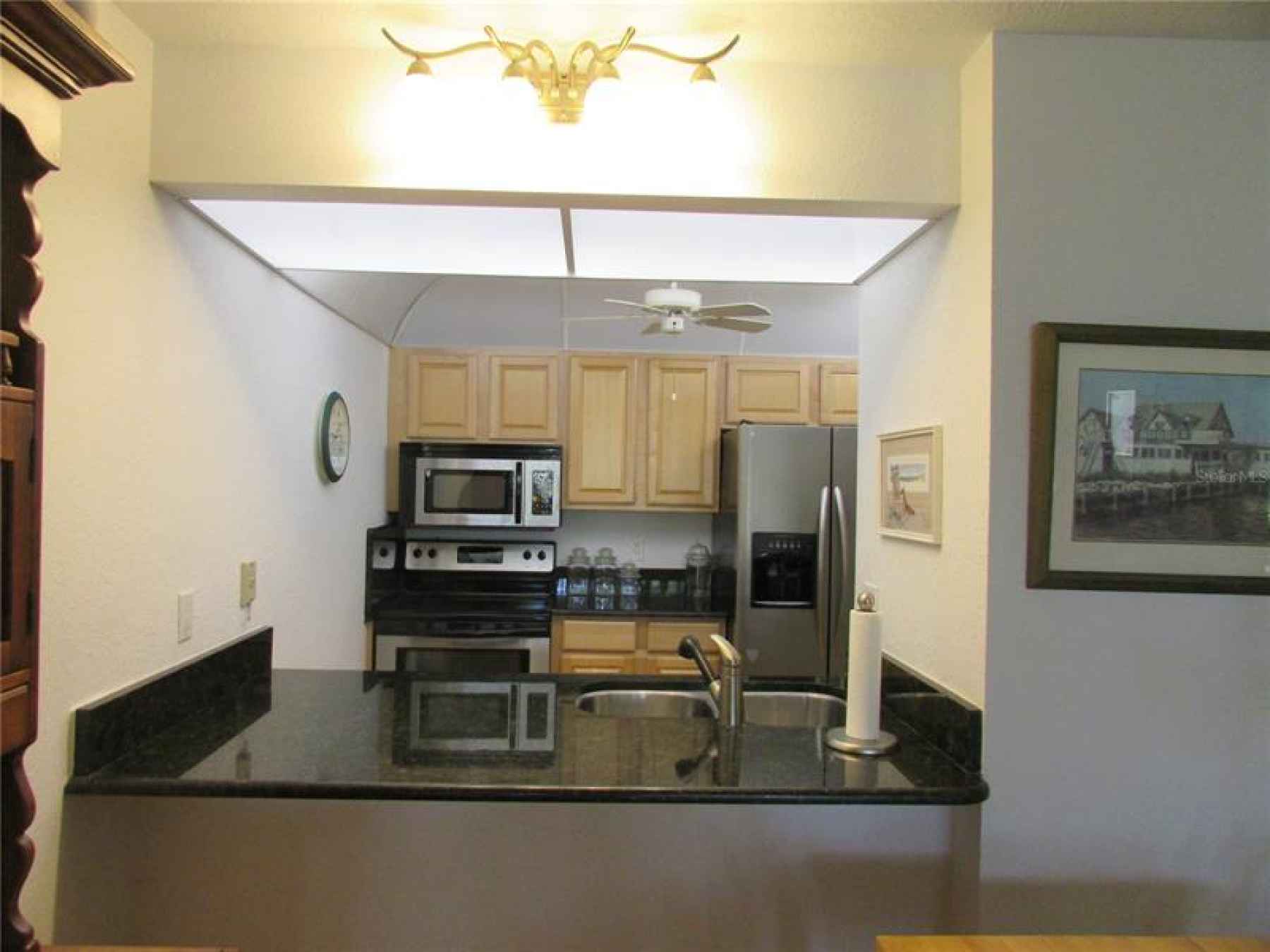 Overlook of kitchen from Dining area