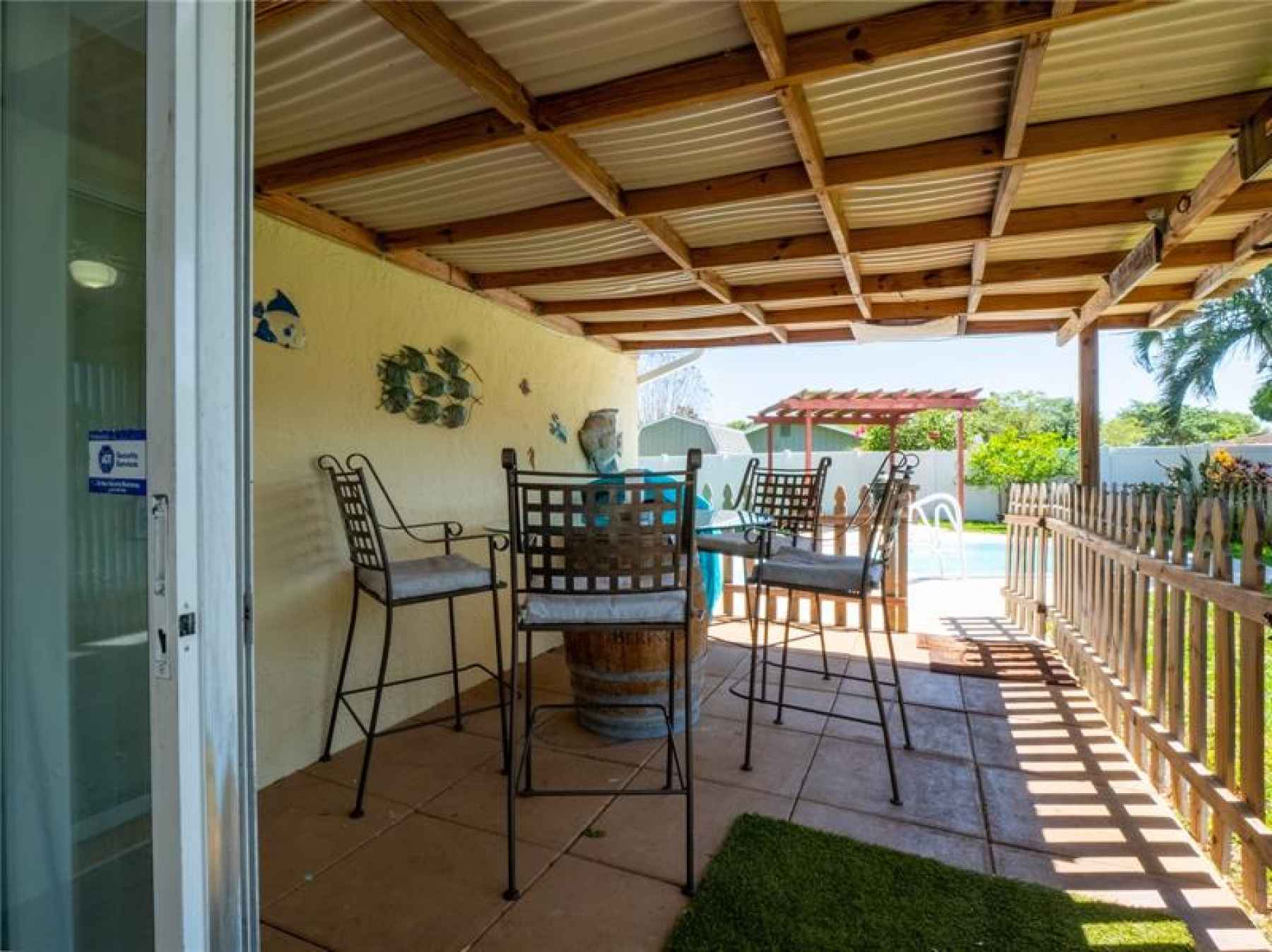 Covered patio off of porch