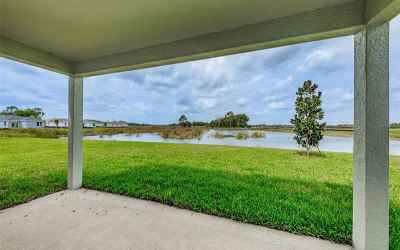 Covered Lanai overlooking the pond and natural surroundings
