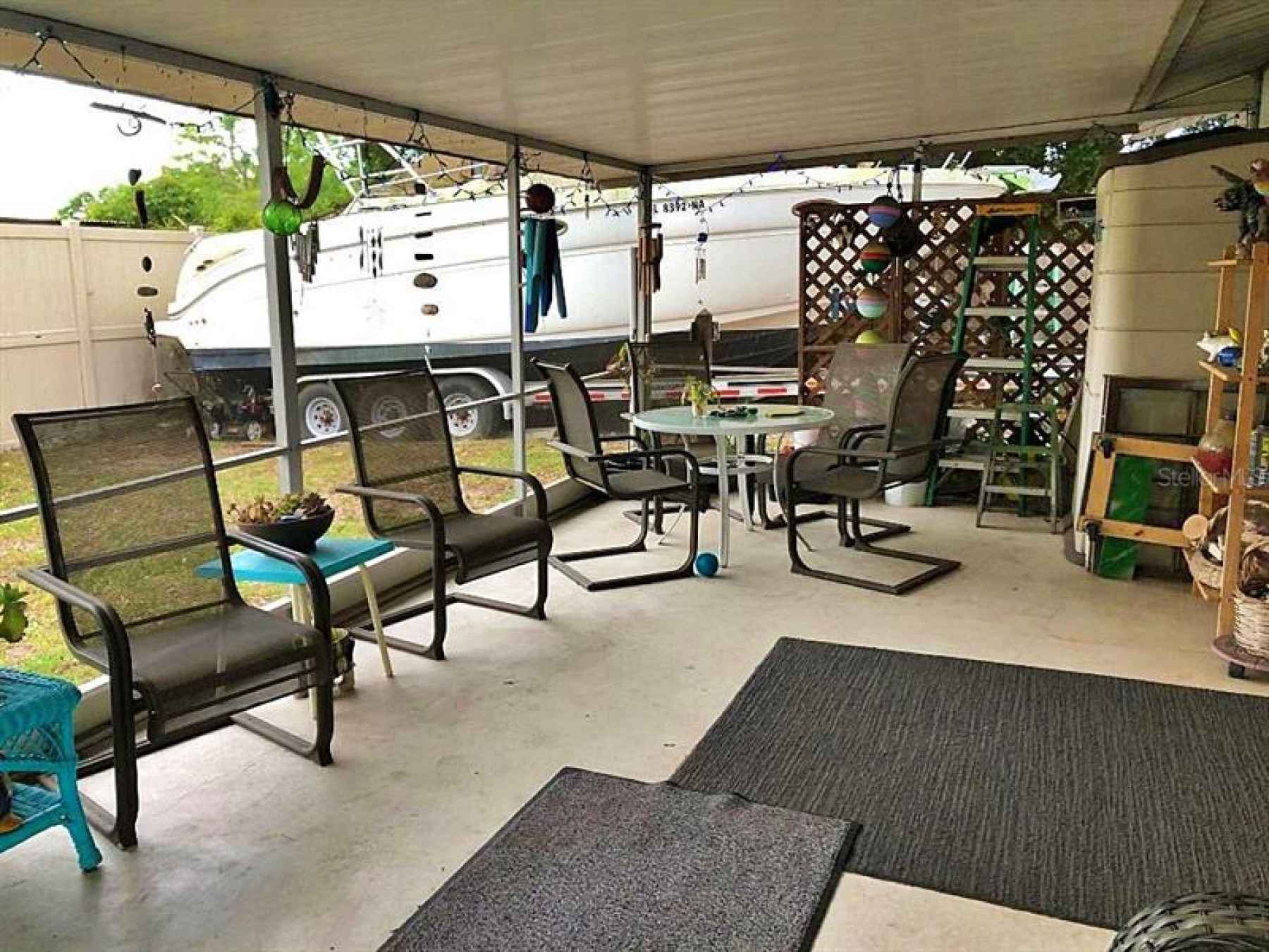 Screened patio with plenty of space for entertaining.