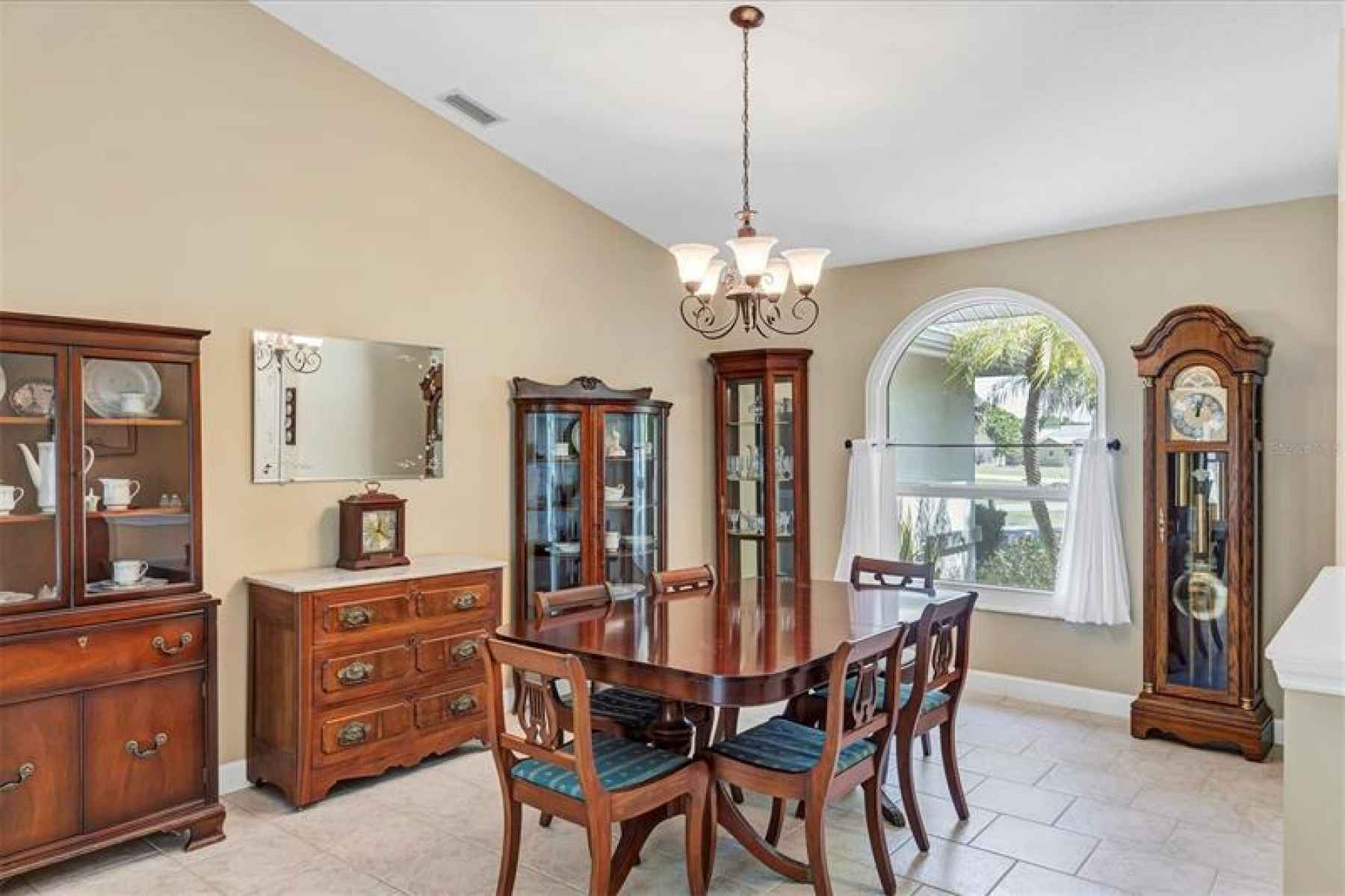 Large formal dining room with high ceilings