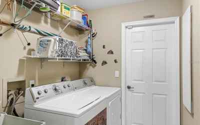 Interior laundry room.  Appliances stay with the home