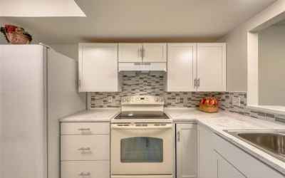 Updated Kitchen with White Shaker Style Cabinets