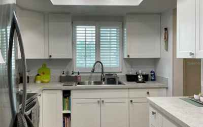 Completely renovated kitchen with new ceiling (recessed lights), cabinets, luxury vinyl floor, appli