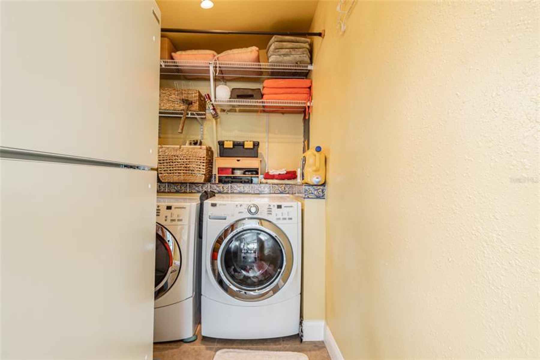 enclosed/inside laundry off of kitchen