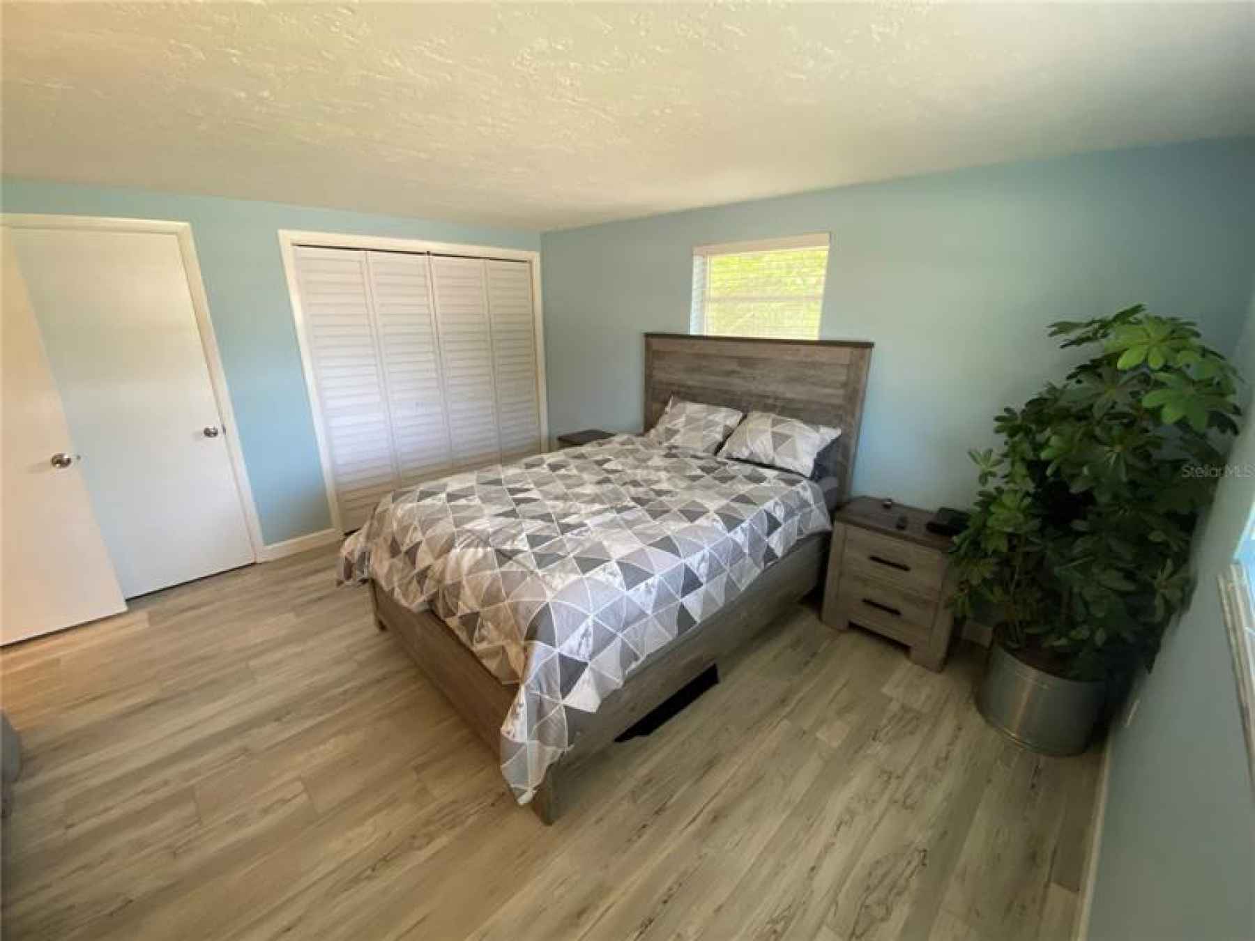 master bedroom with extra cedar closet
