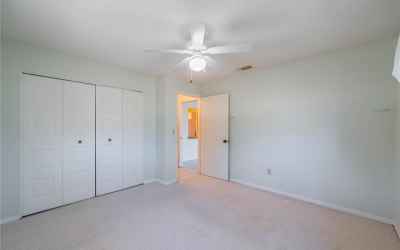 Guest Bedroom has a  pocket door in the hall as well for guests privacy